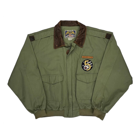 Green jacket with patches on a white background